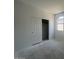 A new bedroom with a sliding closet door and a window providing natural light, ready for personalization at 47719 W Moeller Rd, Maricopa, AZ 85139