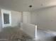 Open-concept living area with fresh paint and lots of light; ideal for entertaining and relaxation at 47719 W Moeller Rd, Maricopa, AZ 85139