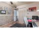 The bedroom has neutral walls and a closet with a white double door and access to other rooms at 4804 S Elm St, Tempe, AZ 85282