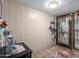 Bright foyer featuring decorative door, tile floors, and convenient coat storage at 4804 S Elm St, Tempe, AZ 85282