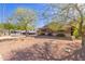 Charming single-story home with desert landscaping, mature shade trees, and RV parking at 4804 S Elm St, Tempe, AZ 85282