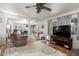 Inviting living room with tile floors and an open layout to the kitchen at 4804 S Elm St, Tempe, AZ 85282