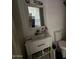 Compact bathroom featuring a single sink vanity, toilet, and neutral tones at 5002 N 41St Ave, Phoenix, AZ 85019