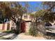A charming townhome featuring desert landscaping and mature shade trees, providing a comfortable outdoor setting at 5002 N 41St Ave, Phoenix, AZ 85019