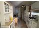 Galley kitchen design with open cabinetry at 5002 N 41St Ave, Phoenix, AZ 85019
