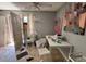 Unstaged living room with large windows and seating at 5002 N 41St Ave, Phoenix, AZ 85019