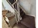 Carpeted staircase with white railing, leading to the upper level of the home at 5002 N 41St Ave, Phoenix, AZ 85019