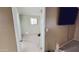 View into a carpeted bedroom with a window and neutral paint at 650 N 65Th Way, Mesa, AZ 85205