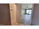 Bedroom featuring neutral colored walls and tile flooring with a closet at 650 N 65Th Way, Mesa, AZ 85205