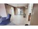 Bright dining area with tile floors, and sliding glass door to the backyard at 650 N 65Th Way, Mesa, AZ 85205