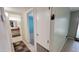 Hallway with tile floors leading to bathroom and bedroom at 650 N 65Th Way, Mesa, AZ 85205
