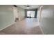Living room showing tiled floors, green walls, sliding doors to backyard and ceiling fan at 650 N 65Th Way, Mesa, AZ 85205