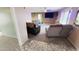 Inviting living room with carpet, ceiling fan, and large windows for natural light at 650 N 65Th Way, Mesa, AZ 85205