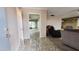 Living room showcasing neutral wall color, a tile entryway and carpeted main area at 650 N 65Th Way, Mesa, AZ 85205
