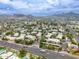 Scenic aerial view of the neighborhood, showcasing mountains in the background at 750 E Northern E Ave # 2145, Phoenix, AZ 85020
