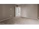 Neutral bedroom featuring carpet, baseboards, closet, and door to a bathroom or second closet at 750 E Northern E Ave # 2145, Phoenix, AZ 85020