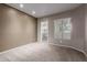 Bedroom featuring neutral paint and carpeting, along with a walk in closet at 750 E Northern E Ave # 2145, Phoenix, AZ 85020