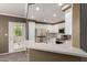 Kitchen featuring white cabinets, stainless steel appliances, and stylish fixtures at 750 E Northern E Ave # 2145, Phoenix, AZ 85020