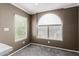 Cozy living room featuring neutral paint, a window with natural light, and neutral carpet at 750 E Northern E Ave # 2145, Phoenix, AZ 85020