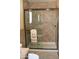 Modern bathroom with walk-in shower, tile surround, and updated fixtures at 8310 E Deep Canyon Ct, Mesa, AZ 85208