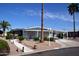 Charming single-story home with covered parking and desert landscaping at 8310 E Deep Canyon Ct, Mesa, AZ 85208