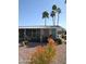 Charming home with covered porch, desert landscaping and curb appeal at 8310 E Deep Canyon Ct, Mesa, AZ 85208