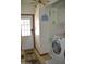 Bright laundry room with modern washer/dryer units and plenty of space at 8310 E Deep Canyon Ct, Mesa, AZ 85208