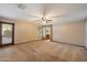Bedroom featuring a ceiling fan and an adjoining bathroom at 1001 N Peppertree Dr, Gilbert, AZ 85234