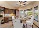 Charming dining area featuring a round table, decorative furnishings, and bright natural lighting at 1001 N Peppertree Dr, Gilbert, AZ 85234