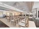 Elegant hall featuring chandeliers, classic columns and neutral color scheme, perfect for event space at 1001 N Peppertree Dr, Gilbert, AZ 85234
