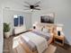 Serene main bedroom with a ceiling fan, natural light, and contemporary furnishings at 1019 N 62Nd Ave, Phoenix, AZ 85043