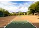 Outdoor community basketball court with mountain views in the background for an active lifestyle at 10875 E Mirasol Cir, Scottsdale, AZ 85255