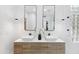 Modern bathroom with a double vanity, decorative lighting, and a modern design at 10875 E Mirasol Cir, Scottsdale, AZ 85255