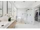 Spa-like bathroom has a soaking tub, walk-in shower and double vanity sinks at 10875 E Mirasol Cir, Scottsdale, AZ 85255