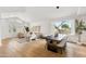 Elegant dining room with ample natural light and open-concept to living area for easy entertaining at 10875 E Mirasol Cir, Scottsdale, AZ 85255