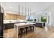 Spacious modern kitchen with a large island, sleek cabinetry, and stainless steel appliances at 10875 E Mirasol Cir, Scottsdale, AZ 85255