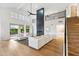 Open living area has a fireplace, high ceilings and a staircase at 10875 E Mirasol Cir, Scottsdale, AZ 85255