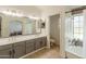 A bathroom with double sinks, updated cabinets, and walk in shower is a must-see! at 1109 E San Pedro Ave, Gilbert, AZ 85234