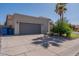 Home featuring a two-car garage and desert landscaping at 1109 E San Pedro Ave, Gilbert, AZ 85234