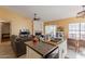 Open-concept kitchen and living area with modern appliances at 1109 E San Pedro Ave, Gilbert, AZ 85234