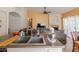 A stainless steel double sink sits in a kitchen island with an open living area beyond at 1109 E San Pedro Ave, Gilbert, AZ 85234