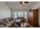 Comfortable living room featuring a bay window and stylish furnishings at 1109 E San Pedro Ave, Gilbert, AZ 85234