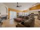 An open floor plan features a spacious kitchen, dining area and a comfortable living space at 1109 E San Pedro Ave, Gilbert, AZ 85234