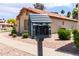 Neighborhood little free library offers a variety of books to borrow and share with colorful, whimsical decor at 1120 N Val Vista Dr # 110, Gilbert, AZ 85234