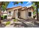 Charming single-story home featuring a neutral stucco exterior and desert landscaping at 1120 N Val Vista Dr # 110, Gilbert, AZ 85234