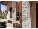 Close-up of modern, rustic house number and decorative flower box detail at 1120 N Val Vista Dr # 110, Gilbert, AZ 85234