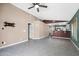 Open-concept space with tile flooring offering views into the kitchen area at 1120 N Val Vista Dr # 110, Gilbert, AZ 85234
