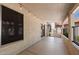 Covered patio with a neutral color scheme, string lights, and tiled flooring at 1120 N Val Vista Dr # 110, Gilbert, AZ 85234