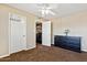 Bedroom featuring neutral walls, plush carpeting, and a large dresser for organized storage at 1126 W Elliot Rd # 1066, Chandler, AZ 85224