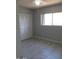 Comfortable bedroom with neutral walls, tile flooring, a ceiling fan, and a closet at 1130 E Butler Dr # B4, Phoenix, AZ 85020